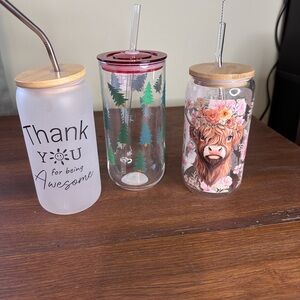 Set of Three Decorative Glass Tumblers with Lids and Straws
